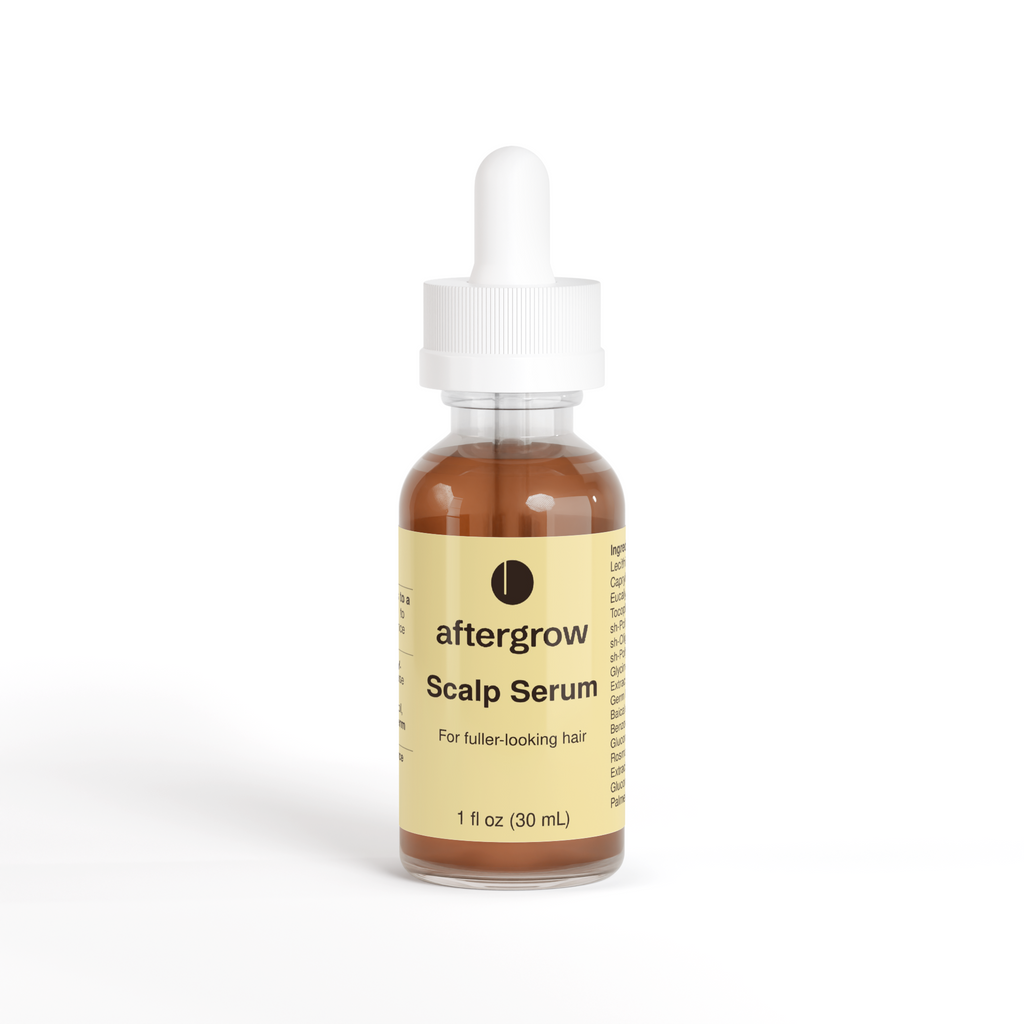 Aftergrow Scalp Serum in an amber dropper bottle with a Butter label.